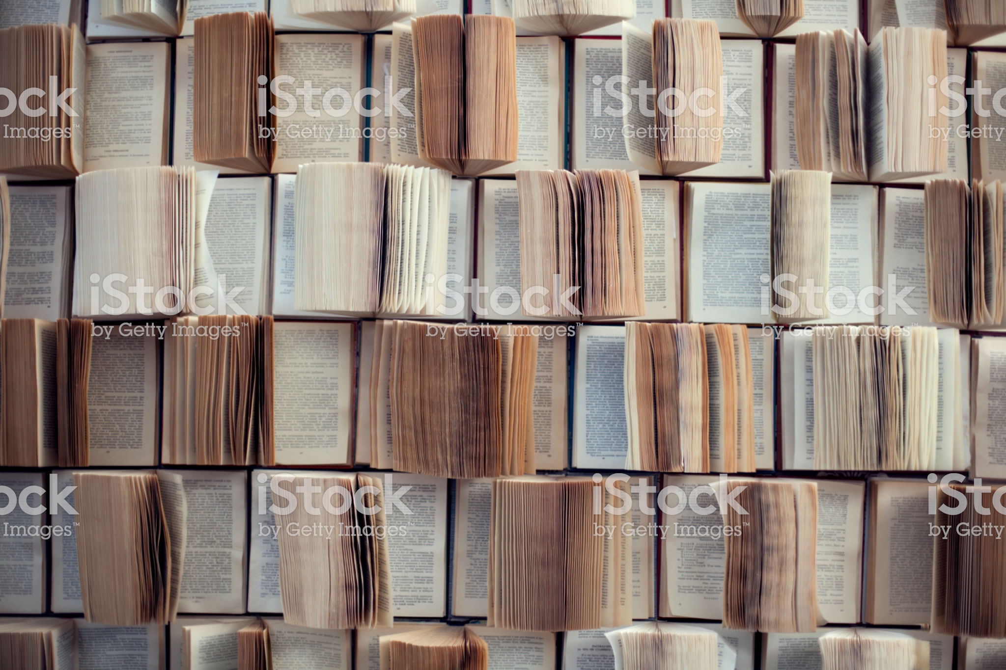 unfocused bookshelf in library interior