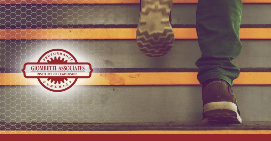 person walking up steps for blog about attaining career satisfaction